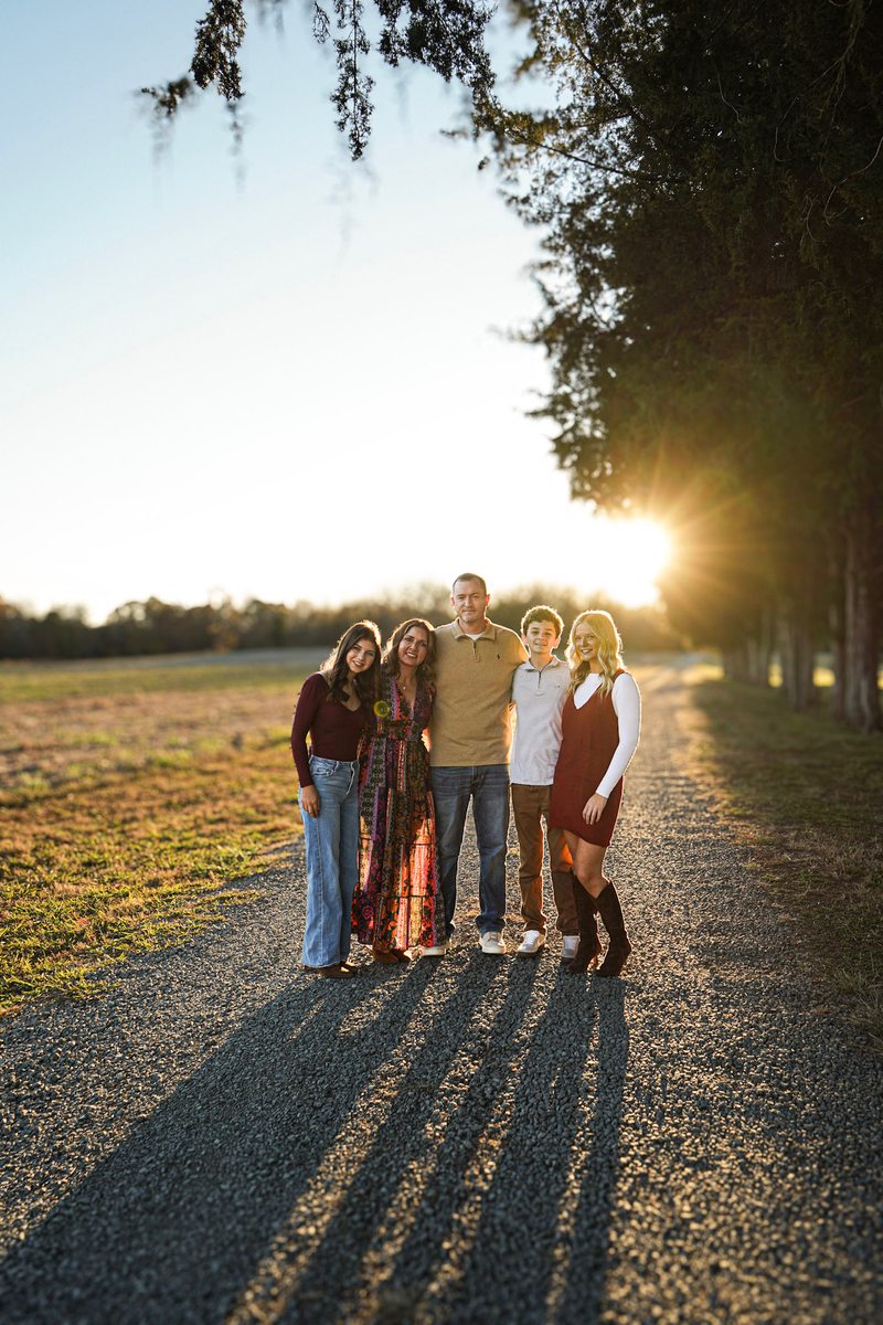 Kevin Stuart with his wife and three children at sunset
